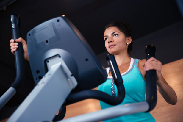 Woman workout on exercises machine